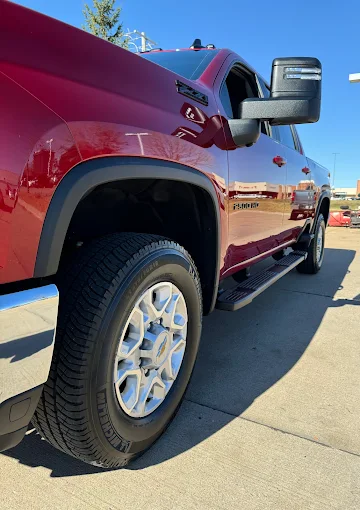 Red truck wheel and side detail